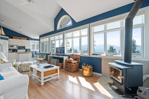 7660 Lichen Road, Anglemont, BC - Indoor Photo Showing Living Room With Fireplace