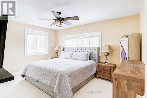 Primary Bedroom with Walk In Closet - 39 Turtle Path, Ramara, ON - Indoor Photo Showing Bedroom