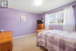 Bright primary bedroom on main floor - 