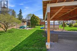 Large partially fenced in backyard - 