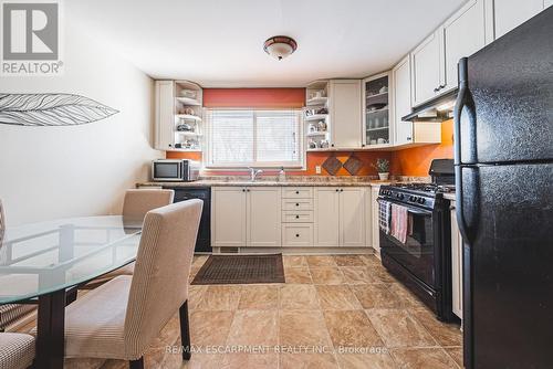 28 Munn Street, Hamilton, ON - Indoor Photo Showing Kitchen With Double Sink