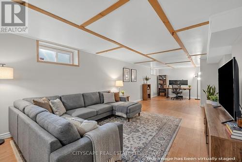Basement Rec Room - Virtually Staged - 39 Glenmorris Street, Cambridge, ON - Indoor Photo Showing Living Room
