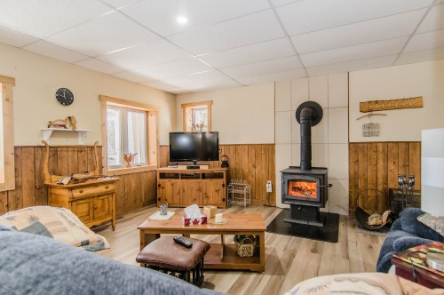 Vue d'ensemble - 2 Ch. Préseault, Notre-Dame-Du-Laus, QC - Indoor Photo Showing Living Room With Fireplace