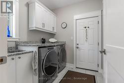 Main Floor Laundry With Garage Access - 