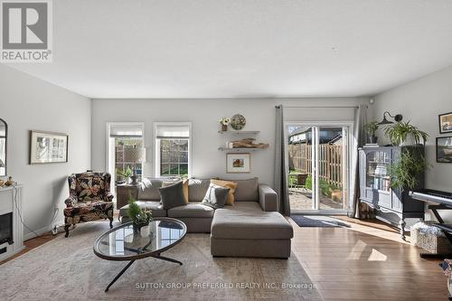 1199 Blackmaple Drive, London East (East A), ON - Indoor Photo Showing Living Room With Fireplace