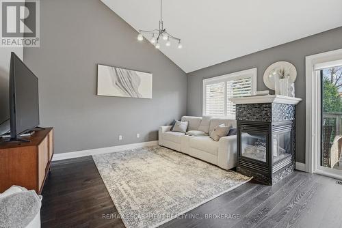 26 - 7 Gibson Place, St. Catharines (Downtown), ON - Indoor Photo Showing Living Room With Fireplace