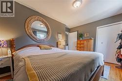 Wood-finish flooring with a neutral area rug - 