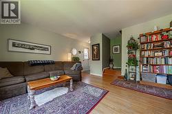 Hardwood flooring extending throughout the main living space - 
