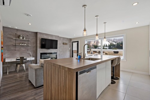 Cuisine - 879-875 Route 117, Mont-Blanc, QC - Indoor Photo Showing Kitchen With Fireplace
