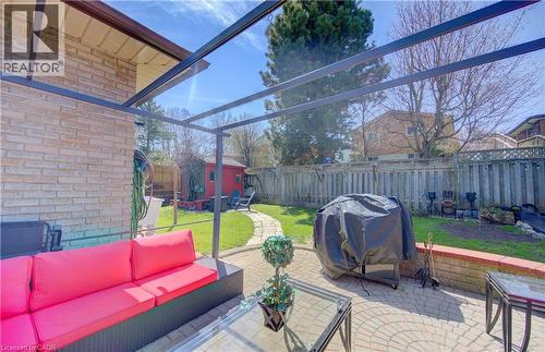 Rear patio featuring a metal pergola structure - 170 Martinglen Crescent, Kitchener, ON - Outdoor