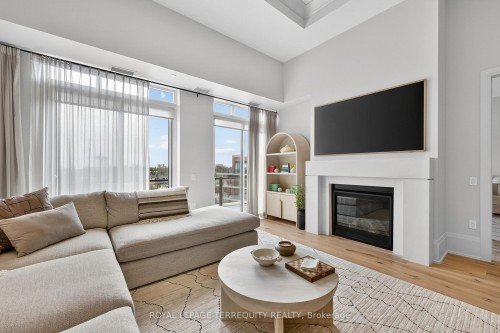 Ph 615-1 Hume Street, Collingwood, ON - Indoor Photo Showing Living Room With Fireplace