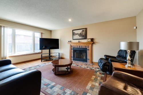 137 National Drive, Hamilton, ON - Indoor Photo Showing Living Room With Fireplace