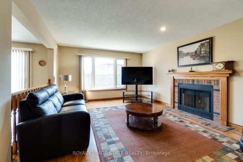 137 National Drive, Hamilton, ON - Indoor Photo Showing Living Room With Fireplace