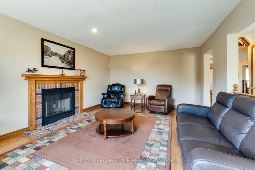 137 National Drive, Hamilton, ON - Indoor Photo Showing Living Room With Fireplace