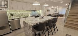 5 - 122 GLEN MANOR DRIVE Toronto, ON M4E 2X6