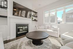 Inviting Living Room Anchored by a Gas Fireplace - 