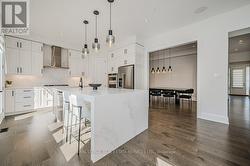 Gourmet Kitchen with an Oversized Island w/Seating - 