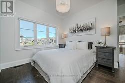 Third Bedroom with Wide Plank Hardwood Flooring - 