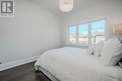Third Bedroom with Wide Plank Hardwood Flooring - 
