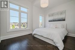 Fourth Bedroom with Wide Plank Hardwood Flooring - 