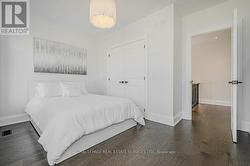 Fourth Bedroom with Wide Plank Hardwood Flooring - 