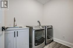 Convenient Upper Level Laundry Room - 