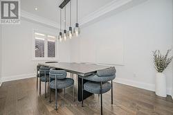 Dining Room Features a Coffered Ceiling - 