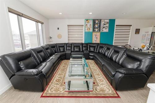 1 Warbler Way, Winkler, MB - Indoor Photo Showing Living Room