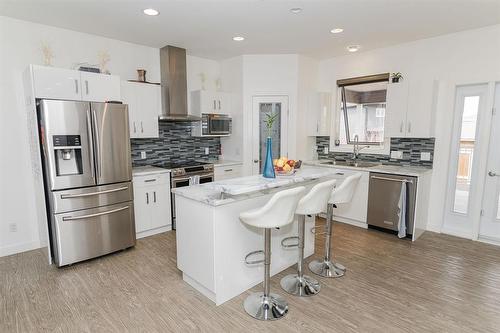 1 Warbler Way, Winkler, MB - Indoor Photo Showing Kitchen With Stainless Steel Kitchen With Upgraded Kitchen