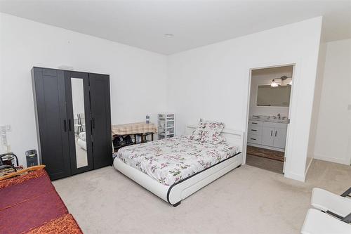 1 Warbler Way, Winkler, MB - Indoor Photo Showing Bedroom