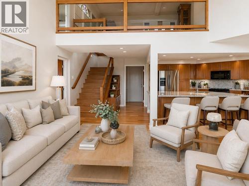 Virtually staged for illustrative purposes. - 1988 Dewdney Road, Kelowna, BC - Indoor Photo Showing Living Room