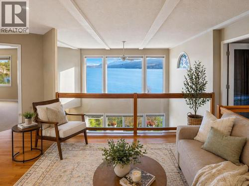 Virtually staged for illustrative purposes. - 1988 Dewdney Road, Kelowna, BC - Indoor Photo Showing Living Room