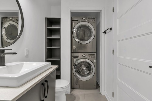 Salle de bains - 103-270 Rue De L'Harmonie, Delson, QC - Indoor Photo Showing Laundry Room