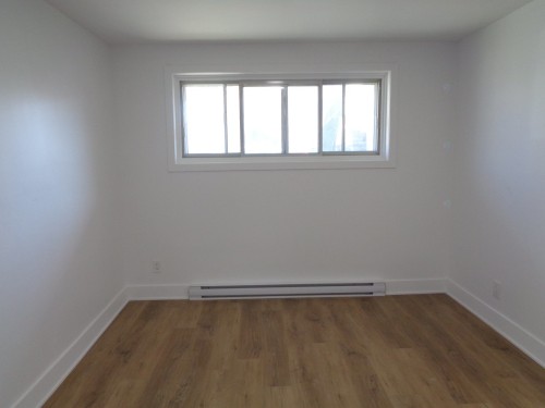 Living Room - 8876A Boul. Provencher, Montréal (Saint-Léonard), QC - Indoor Photo Showing Other Room