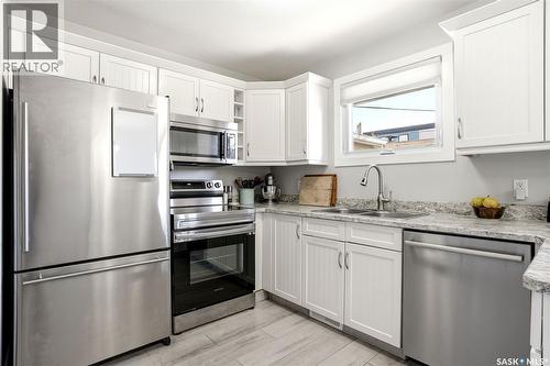 1115 12Th Avenue E, Regina, SK - Indoor Photo Showing Kitchen With Double Sink