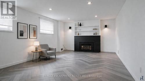 VIRTUALLY STAGED - 1443 Birchwood Drive, Mississauga, ON - Indoor Photo Showing Living Room With Fireplace