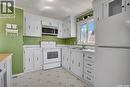 82 2Nd Street, Osler, SK  - Indoor Photo Showing Kitchen With Double Sink 