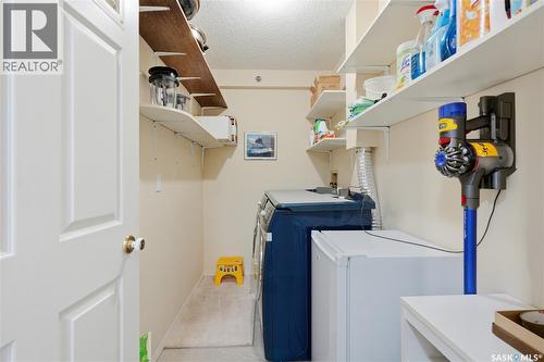 402 301 Cree Crescent, Saskatoon, SK - Indoor Photo Showing Laundry Room