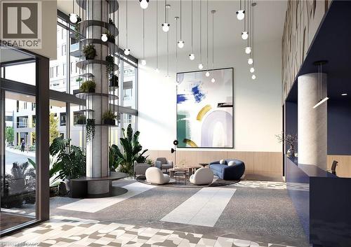 Lobby featuring a soaring ceiling, multi-level planter column, oversized abstract artwork, large format windows, and a patterned floor with contrasting inlays - 4878 Powers Common Unit# 1108, Burlington, ON -  Photo Showing Other Room