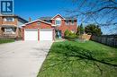 Brick two-story residence featuring a bay window and arched entry over the front door - 44 Lorilee Crescent, Kitchener, ON  - Outdoor 
