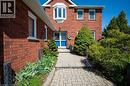 Brick exterior featuring a bay window, paver walkway, and mature landscaping - 44 Lorilee Crescent, Kitchener, ON  - Outdoor 