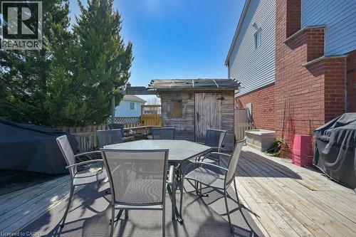 Spacious outdoor wood deck with a privacy fence and mature trees - 44 Lorilee Crescent, Kitchener, ON - Outdoor With Deck Patio Veranda With Exterior