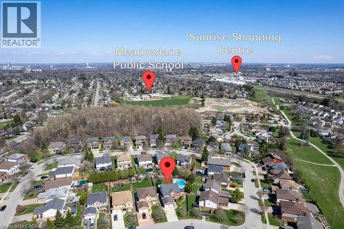 Aerial perspective of a residential neighborhood with a prominent central property - 44 Lorilee Crescent, Kitchener, ON - Outdoor With View