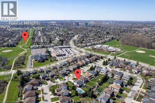 Aerial perspective showcasing a residential neighborhood with a prominent community trail and green spaces - 44 Lorilee Crescent, Kitchener, ON - Outdoor With View