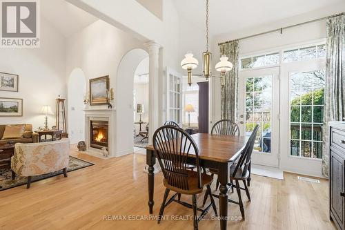 4172 Stonebridge Crescent, Burlington, ON - Indoor Photo Showing Dining Room With Fireplace