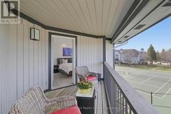 Covered balcony off of the Primary Bedroom - 