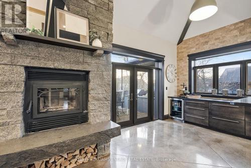 4858 Trulls Road, Clarington, ON - Indoor Photo Showing Living Room With Fireplace