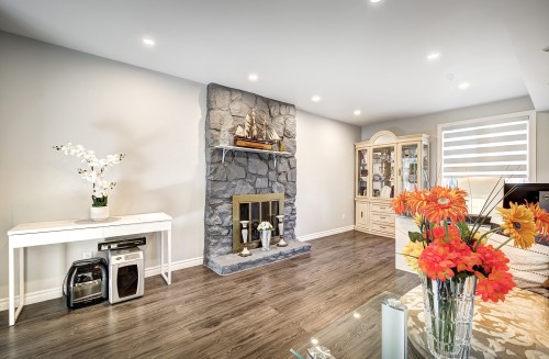 Family Room - 74 Rue Chatillon, Dollard-Des-Ormeaux, QC - Indoor Photo Showing Living Room With Fireplace