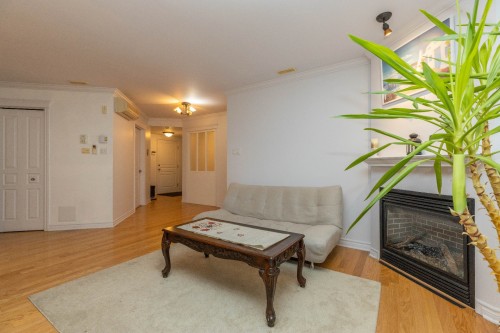 Salon - 7-1425 Rue Leclair, Montréal (Verdun/Île-Des-Soeurs), QC - Indoor With Fireplace