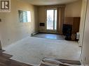 201 207C Tait Place, Saskatoon, SK  - Indoor Photo Showing Other Room With Fireplace 
